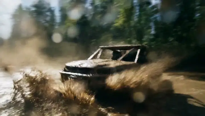 Off-road vehicles racing through a river crossing